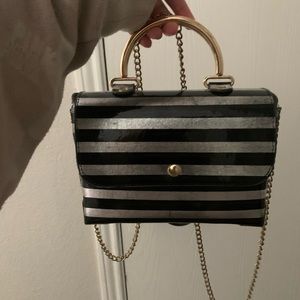 Silver and black purse